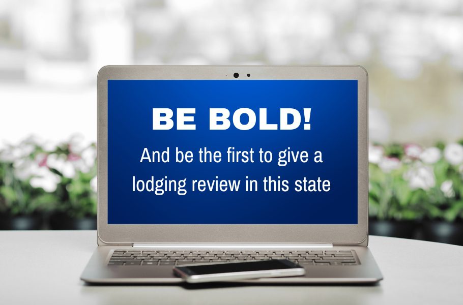 A laptop with the words be bold on it.